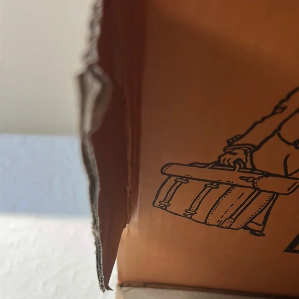 Louis Vuitton Signature  Box inside a LV shipping box with tissue and ribbon.
